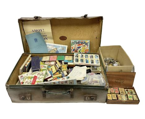 Large collection of matchboxes, together with a large quantity of silver plated souvenir spoons, in a vintage suitcase