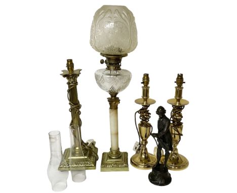 Oil lamp with frosted floral shade and cut glass reservoir, upon cast brass and marble base, together with a cast brass Corin