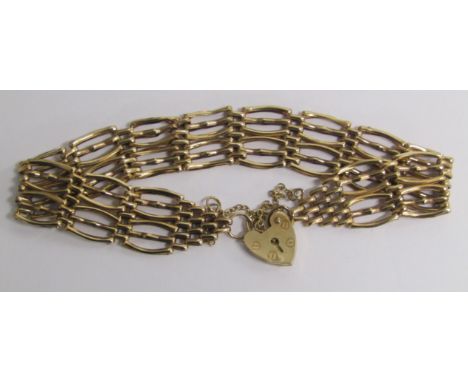 9ct gold gate bracelet with heart lock and safety chain - total weight 6.7g