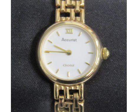 9ct gold Accurist ladies watch with box and extra link - total weight 12g