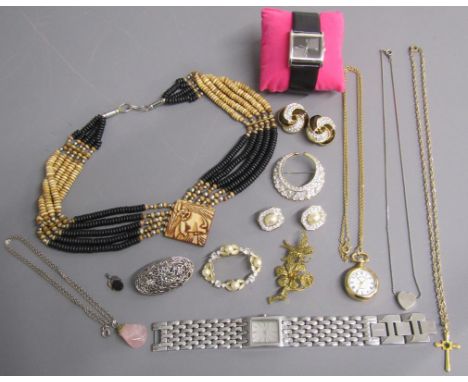 Collection of costume jewellery includes DKNY watch, necklaces, fob watch, rose quartz pendant on chain, brooches etc