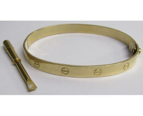 Cartier style 9ct gold manacle bangle with yellow metal screwdriver - bangle weight only 21.1g&nbsp;