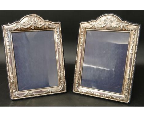 Pair of silver easel photograph frames with embossed swag decoration, maker Carrs Sheffield 2009, 10.5cm w x 17cm h