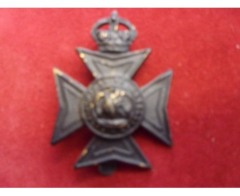 Oxford and Buckinghamshire Light Infantry (Buckinghamshire Battalion) WWI Territorial Cap Badge (Blackened-brass), slider. K&