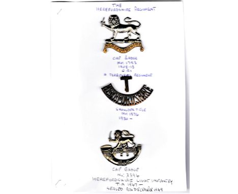 The Herefordshire Regiment WWI Cap Badge (Bi-metal), slider. K&amp;K: 1793, with a shoulder Title and Territorial 'T' Device 