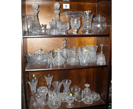 A large collection of cut glass, including decanters, bowls, tazza, vases, glasses, etc, and a Poole dish, signed and dated 1