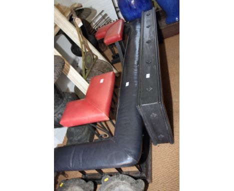 A wrought iron club fender with black leather top, 70" wide