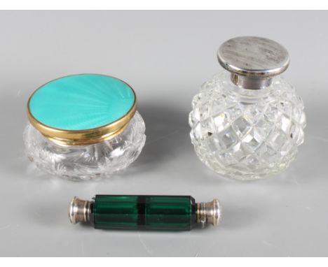 A 19th Century green glass double ended scent bottle with silver plated tops, a diamond moulded glass scent bottle with silve