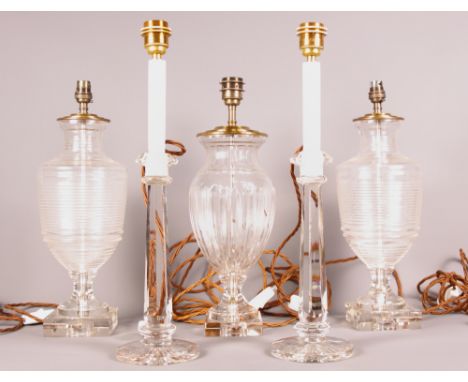 A pair of cut glass vase style table lamps on square bases, 17" high, a single cut glass table lamp on square base and a pair