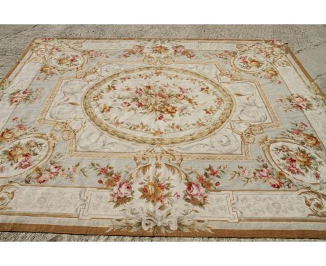 An Aubusson type tapestry carpet of traditional 18th Century design, roses on a light ground, 93" x 119" approx