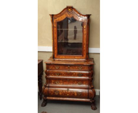 A 19th Century Dutch marquetry decorated commode cabinet, upper arched top display cabinet enclosed glazed sides and door, ba