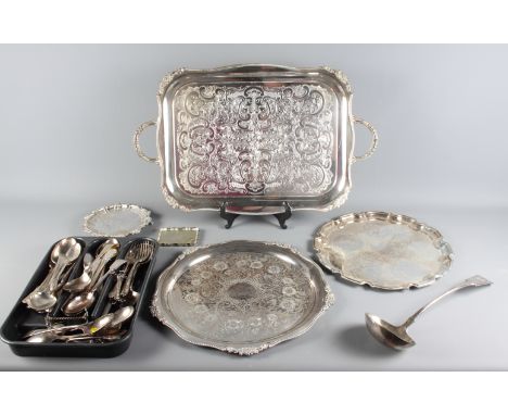 A Dunhill silver plated cigarette lighter, six plated trays and a collection of plated flatware