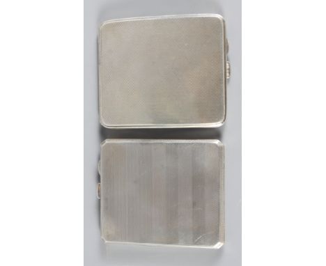 Two silver cigarette cases with engine turned decoration, 9oz troy approx