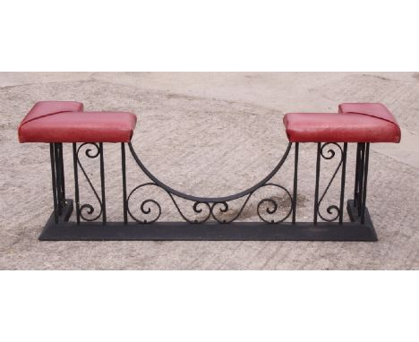 A black wrought iron club fender, 56" wide