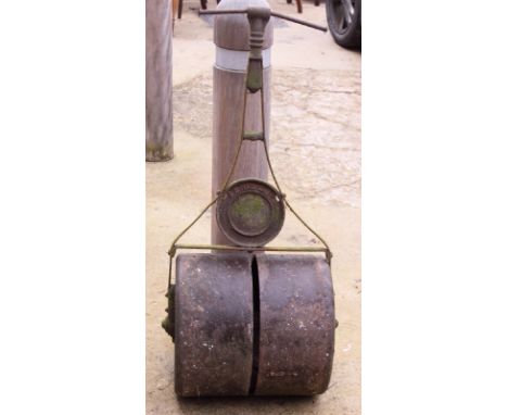 A cast iron garden roller