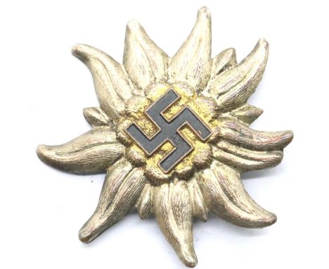 German WWII type Wehrmacht Edelweiss cap badge. P&amp;P Group 1 (£14+VAT for the first lot and £1+VAT for subsequent lots) 
