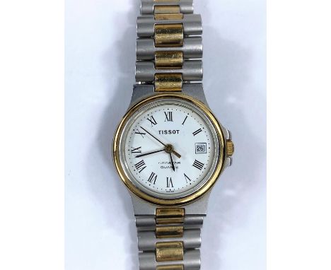 A ladies Tissot digital watch with two-tone case and strap, original box 
