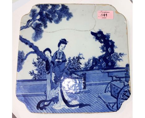 A Chinese blue and white ceramic tile depicting ladies on a balcony, width 25cm (restored) 