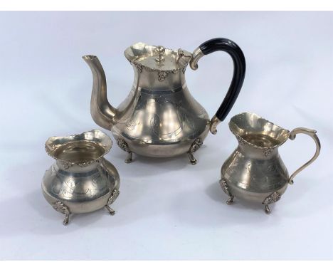 A white metal tea service in continental style, stamped silver to base. 
