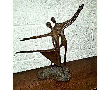 A bronze abstract group of a couple dancing, in a simplified stick like form, height 40cm. 