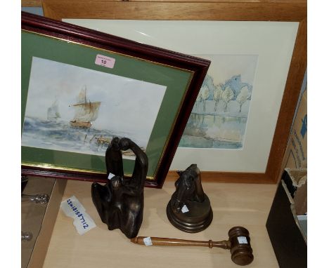 A watercolour of a lake, a watercolour of ships at sea, 2 bronze effect sculptures and a gavel 
