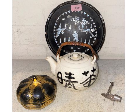 A Japanese lacquer lidded box in gilt and black in the form of fruit, a Japanese ceramic tetsubin, a Chinese miniature white 