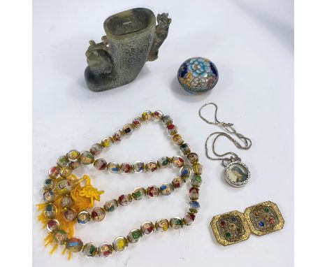 An Indian white metal locket with male and female portrait to each side; Chinese painted glass beads etc 