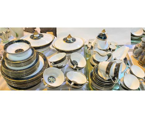 A "Carlyle" H5018 dinner and tea service by Royal Doulton, 8 setting, 76 piecestea cups second quality otherwise all lst qual