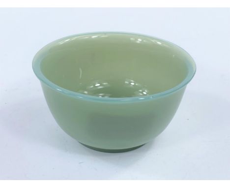 A Chinese jade coloured Peking Glass bowl, diameter 11cm.&nbsp;&nbsp;Good condition.&nbsp;