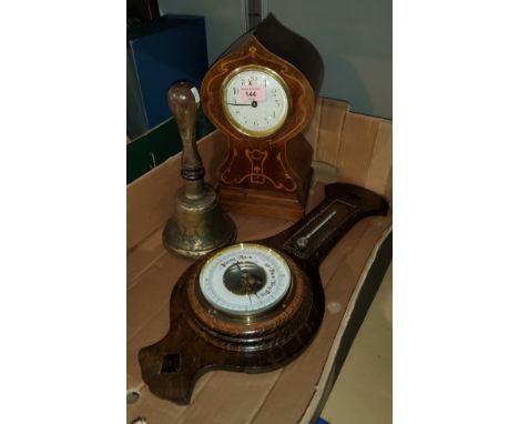 An early 19th century Art Nouveau mantel clock; an Arts &amp; Crafts style wall hanging barometer; a school bell