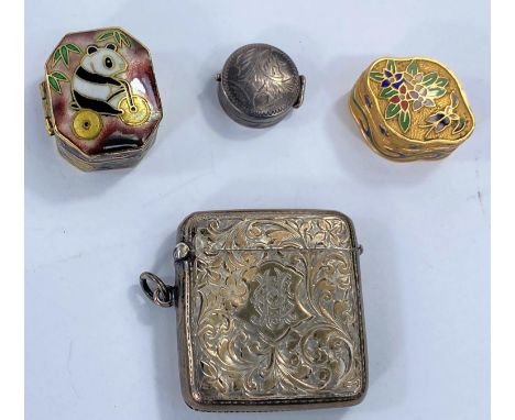 A hallmarked silver vesta case, a small white metal pill box and 2 other miniature enamel boxes 