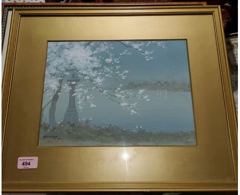 A Japanese watercolour of a blossom tree with white petals, a stone lamp with a lake in the back ground, signed Kyoha, framed