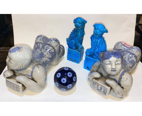 Two Chinese ceramic neck rests in the form of a man and a woman crouching; other similar ceramics.&nbsp;&nbsp;All pieces in g