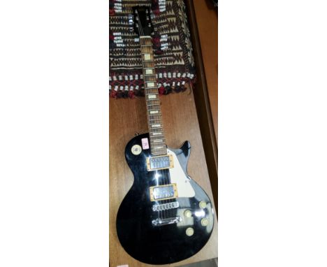 A 1980's guitar, Hondo black Les Paul model 