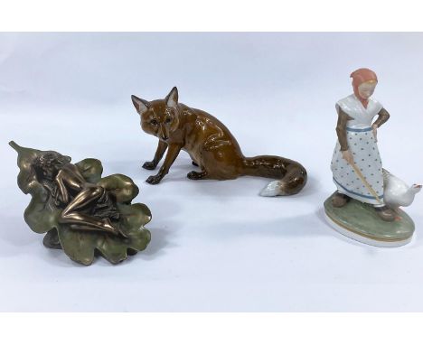 A Rosenthal model of a seated fox, length 25cm; a Copenhagen figure of girl with goose, height 19cm (beak tip chipped); a bro