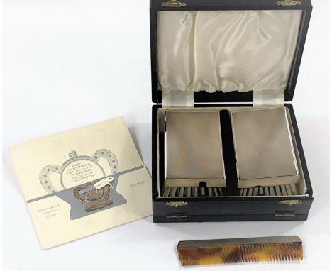 A gent's pair of silver back hairbrushes, with comb, cased; a QEII 1977 souvenir note clip