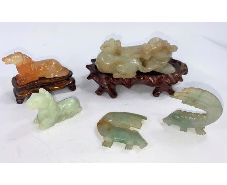 A Chinese carved jade coloured, hardstone group of rams, other similar carvings etc.&nbsp; The main carving is in good condit