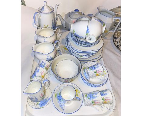 A 1930's Grafton part tea/coffee service decorated with hollyhocks, 40 pieces approx 