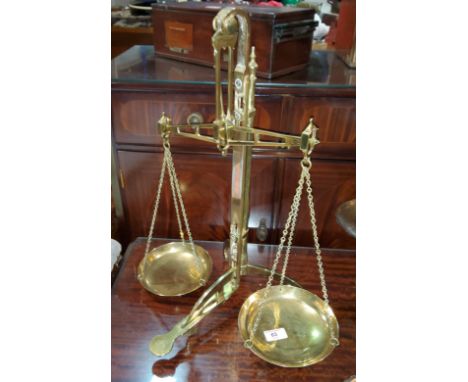 A 19th century set of brass bank scales by W &amp; T Avery, Birmingham, height 56 cm 