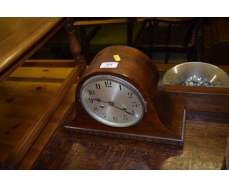 A mahogany cased two hole mantel clock; and a wooden tray 