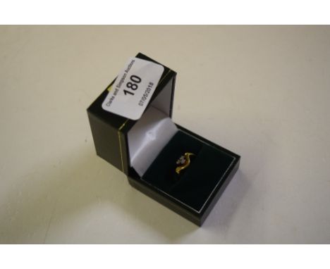 An 18ct gold three stone diamond set ring 