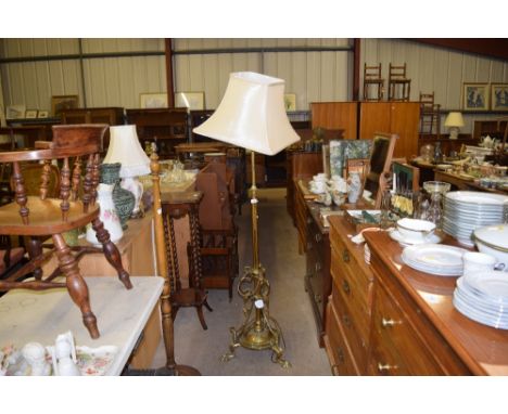 An early 20th Century brass telescopic standard lamp and shade 