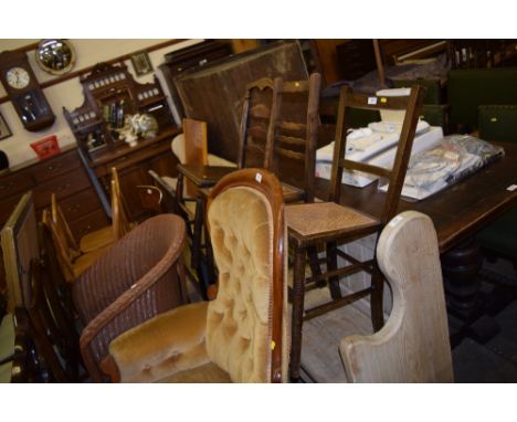 Two cane seated bedroom chairs; and a 19th Century country oak ladder back chair 