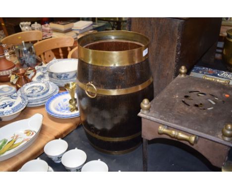 An antique brass bound and oak stick stand 
