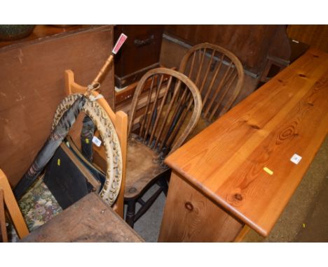 A pair of elm seated stick back kitchen chairs 