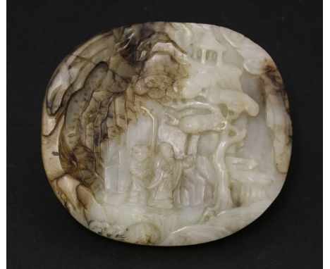 A jade plaque,18th century, carved with an elderly man with a peach in his left hand, with an attendant beside him, under a p