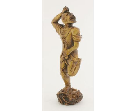 A stag antler carving of Kui Xing, Ming dynasty (1368-1644), The God of Literature standing with his right leg on the back of