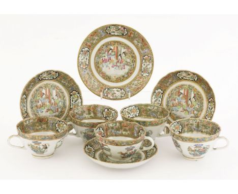 A group of Canton enamelled teawares, late 19th century, comprising five teacups, three saucers, and a dish, all enamelled wi
