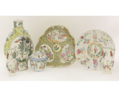 A group of Canton enamelled famille rose, late 19th-early 20th century, comprising a pair of wall vases, painted with a lady 