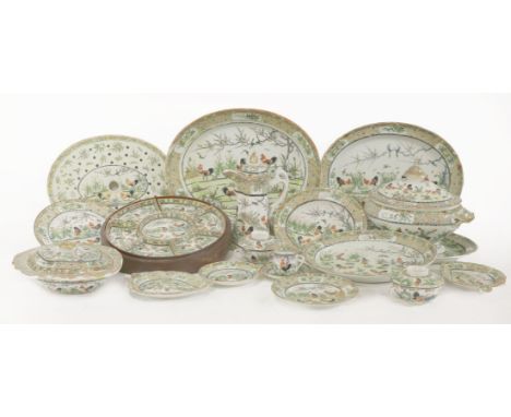 An extensive Canton famille rose porcelain Table Service,Republic Period, brightly decorated and gilt with cockerels in garde